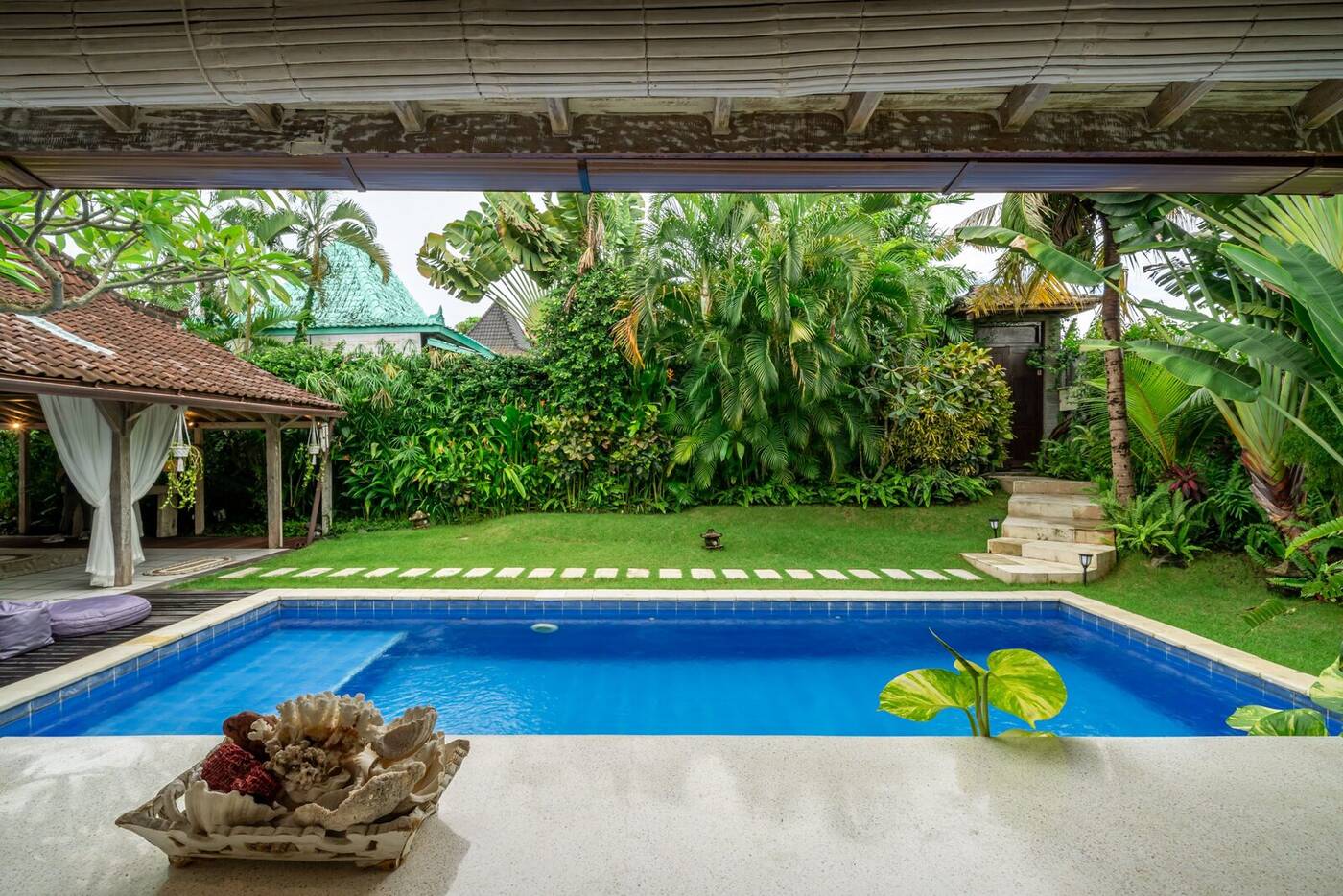Pool view from the terrace of a private villa in Canggu, Bali