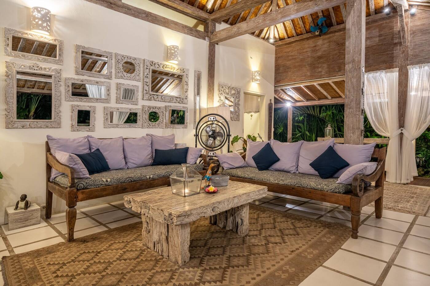 Living room with daybeds and cushions, villa in Berawa, Bali