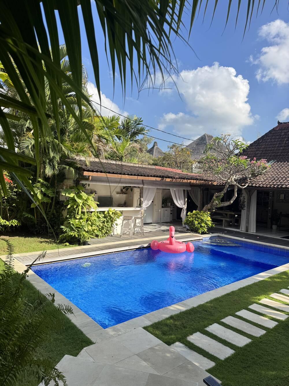 Pool with poolside bar and Balinese Joglo roof, Berawa, Bali
